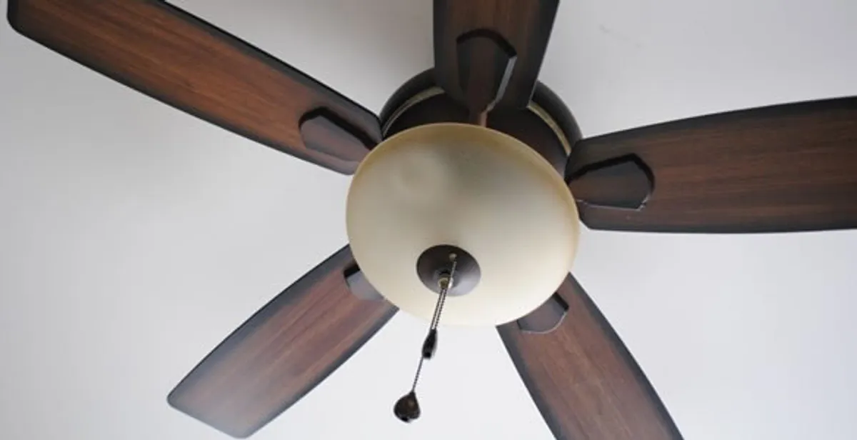 Fully installed ceiling fan with balanced blades and light fixture in Charlotte, NC