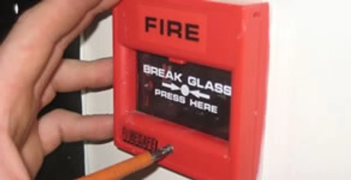 fire alarm installation service showing manual fire alarm pull station installed by licensed electricians in Charlotte, NC
