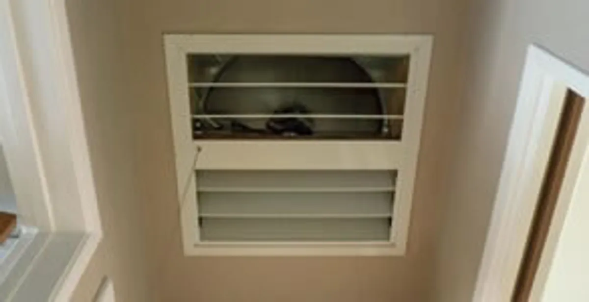whole house fan installation services with ceiling-mounted ventilation system in Charlotte, NC